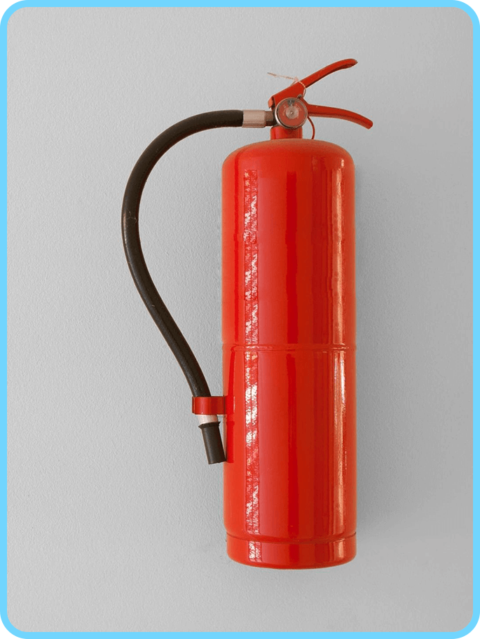 A red fire extinguisher is on the wall.